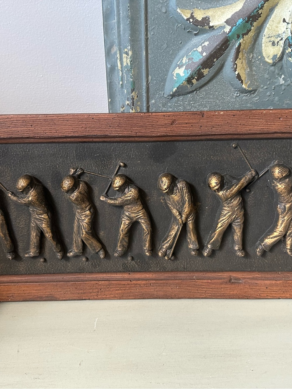 Vintage golf swing bronze with wood frame wall hanging